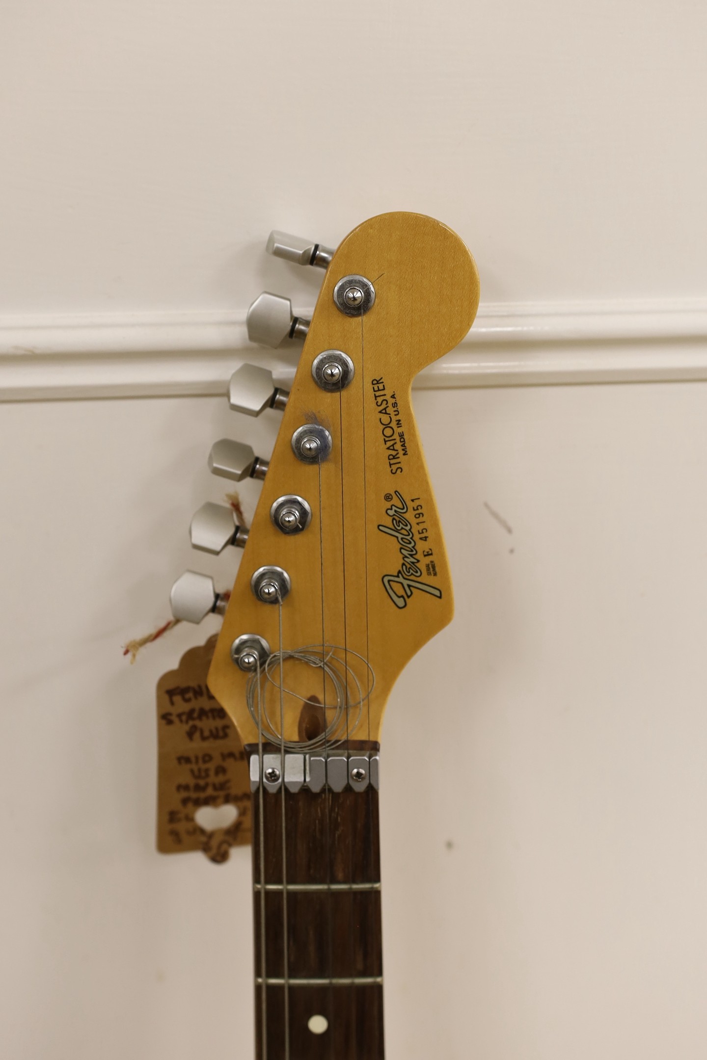 A 1980’s Fender Stratocaster, U.S.A. Serial No. E451951, lace sensor pickups with hard flight case, 98cms high.